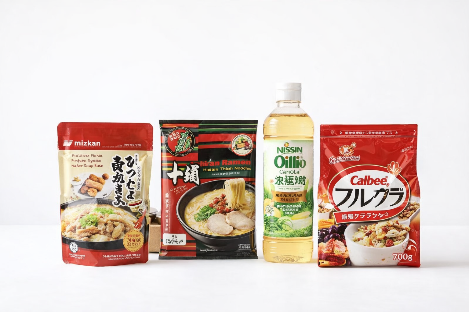 Japanese instant food including ramen, soup bases, cereal, and cooking essentials on a clean white background